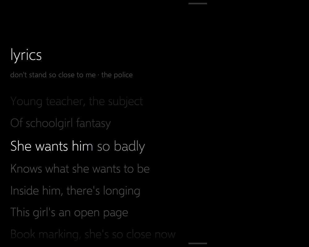 Synced lyrics on the tablet, with the current line highlighted.